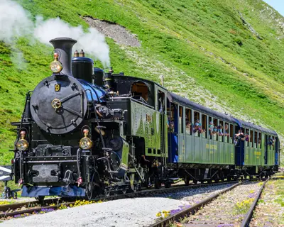 Furka steam train. Mountain route. Switzerland. Adventure travel during the coronavirus.