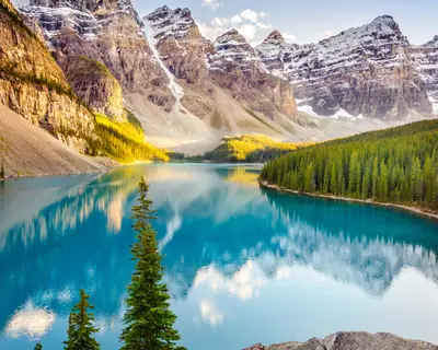Landscape view of Moraine lake and mountain range at sunset in Canadian Rocky Mountains