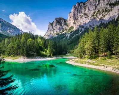 500px Photo ID: 105356171 - Another image from my visit of the famous Green Lake in Styria, Austria. What an incredible beauty. 
It really looks that surreal there. But it gets even worse in spring: when the snow is melting the water surface rises some more meters and covers trees, grass, paths, bridges and benches - there are incredible under water photographs of the Green Lake out there.
Thanks for viewing!