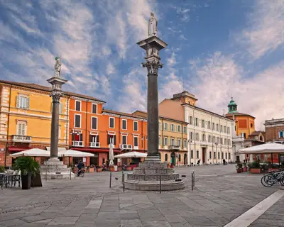 Ravenna, Emilia-Romagna, Italy: the main square Piazza del Popolo with the ancient buildings and the columns with the statues of Saint Apollinare and Saint Vitale
